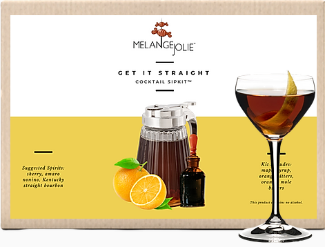 Mélange Jolie Get It Straight Cocktail SipKit™ featuring a glass, bar spoon, cocktail sticks, Vermont maple syrup, dehydrated oranges, navel orange, and mole bitters.